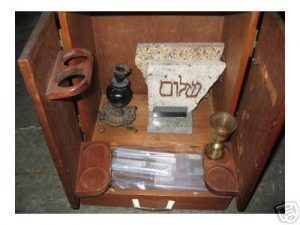 photo shows the content of the dybbuk box, listed below.