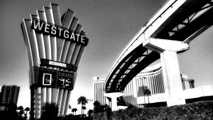 Photo shows an interstate bridge next to a retro ‘Westgate’ sign. The Hilton hotel is also pictured in the background.